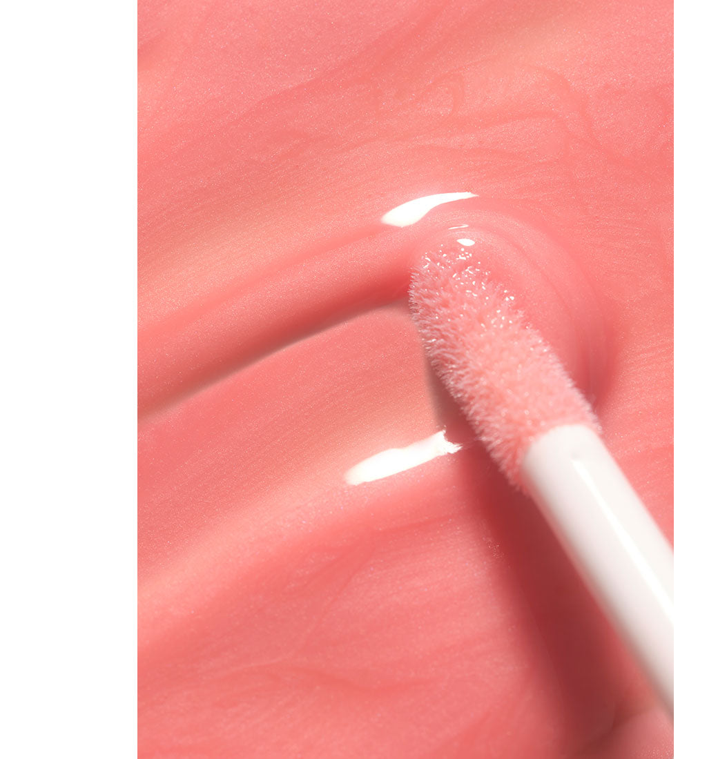 Ästhetischer Texturswatch des neuen Pfirsichtons des Lip Wonder Serums
