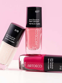 Drei Farben des Art Couture Nail Lacquer (weiß, rosa, pink)